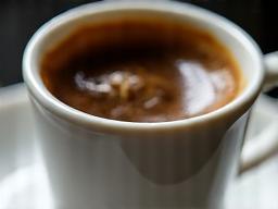 Close up of a freshly brewed espresso cup